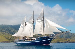 Side view on Dewi Nusantara liveaboard yacht for charter