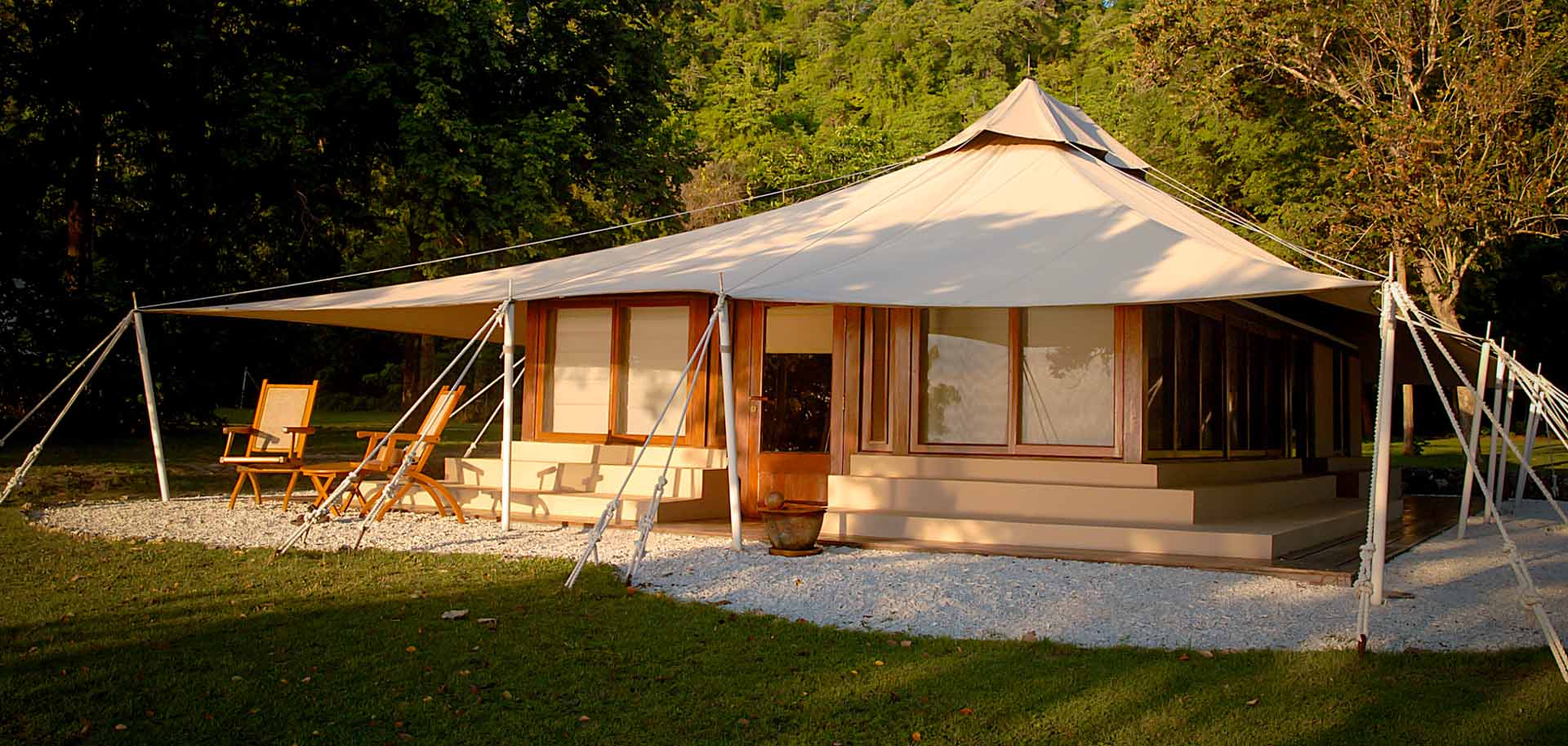Exterior of the Amanwana resort luxurious tent as part of the Aman Adventure