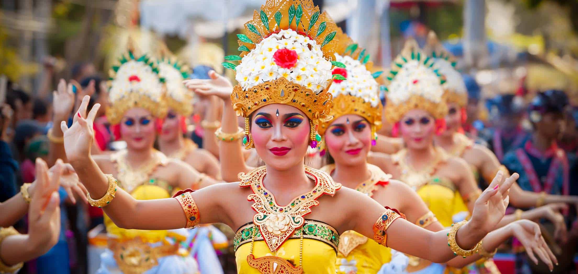 Balinese dancers in Ubud, dressed in traditional Balinese clothes and strong make-up