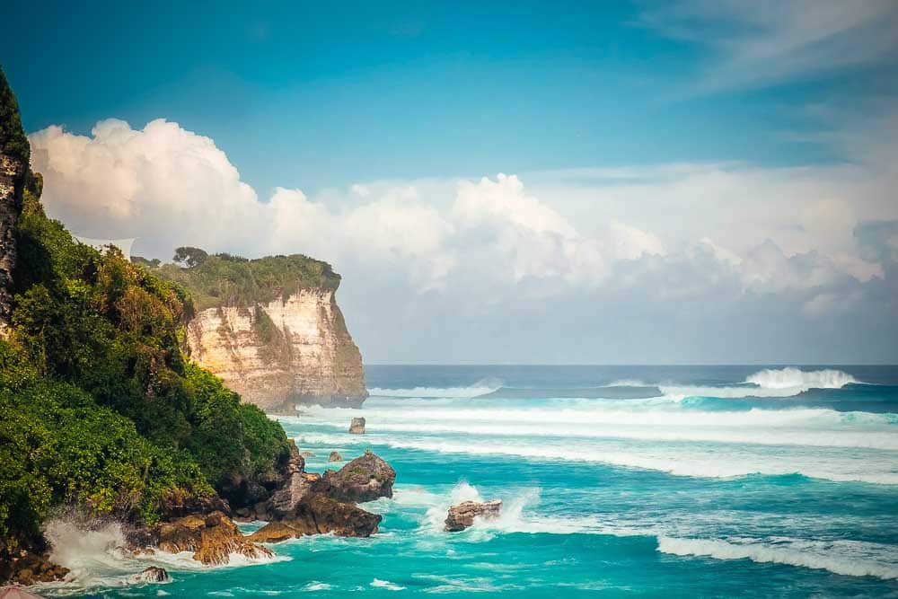 Waves crashing on the cliffs on Bali's coastline