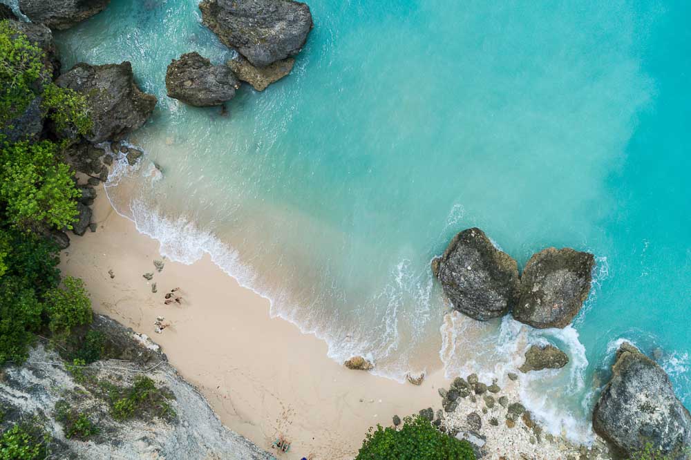 Top down view on an untouched beach and pristine waters