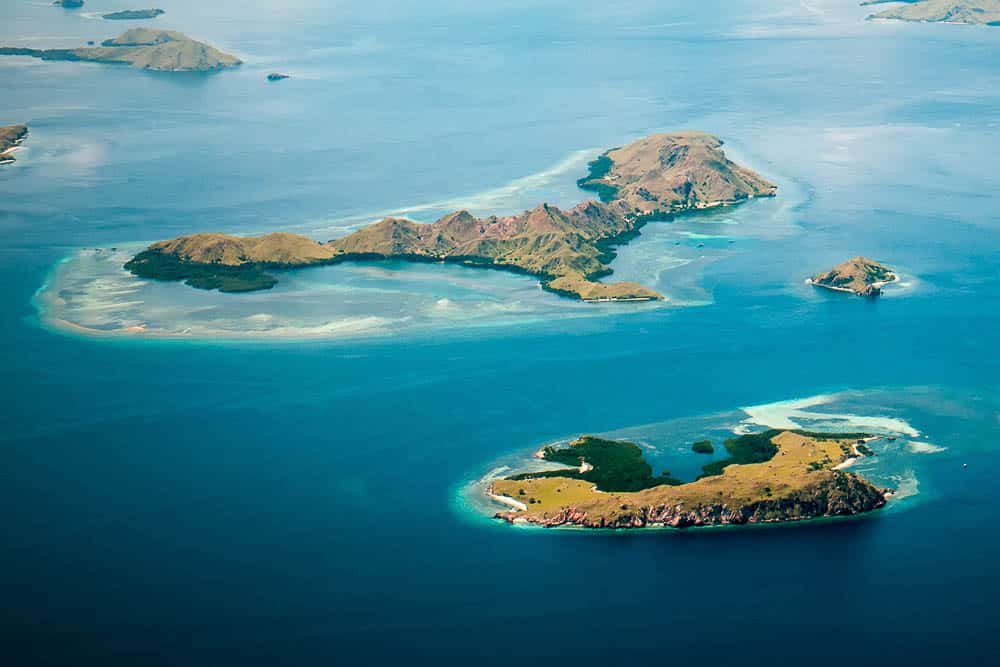 Aerial view on Padar Island with blue waters and smaller islands surrounding it