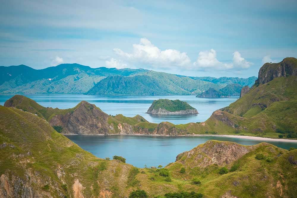 View on green hills of Padar Island in Komodo National Park and the waters surrounding it