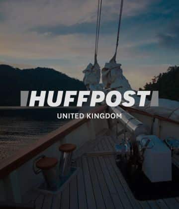 Huffpost United Kingdom with a front yacht bow in the background